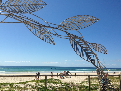 Paradise - Girt By Sea, by Jules Hunt (NSW). Part of an archway of steel, copper and aluminium leaves.